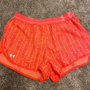 Orange UA athletic shorts